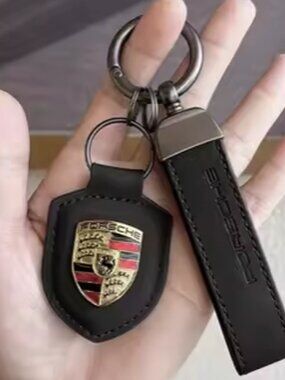 Porsche BLACK and Gold Keychain Pendant Black Leather Raised Metal Logo. NWT
